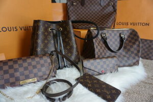 Pawn Louis Vuitton Bags, belts, sunglasses and jewelry and have cash in your in 20 minutes or less at Oro Express Chandler